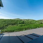 In With Dune Views *