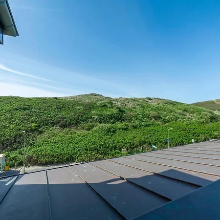 In With Dune Views *